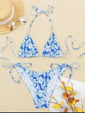Women's halter swimsuit with floral pattern in multiple colour options