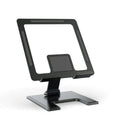Flat desktop foldable rotating metal bracket for notebook in black alloy finish on desk