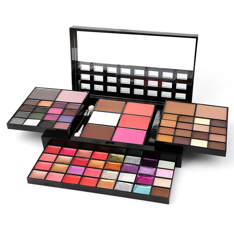 74 colour makeup palette with four layers showing eyeshadows, lip glosses, blush and contour powders with brush set