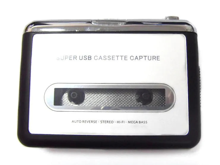 Cassette tape to MP3 converter unit with USB cable on a desk