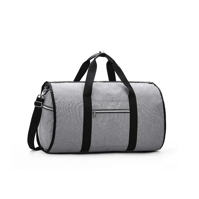 Cylinder-shaped travel bag in Oxford cloth, shown in one of four colours: black, blue, light grey, or red.