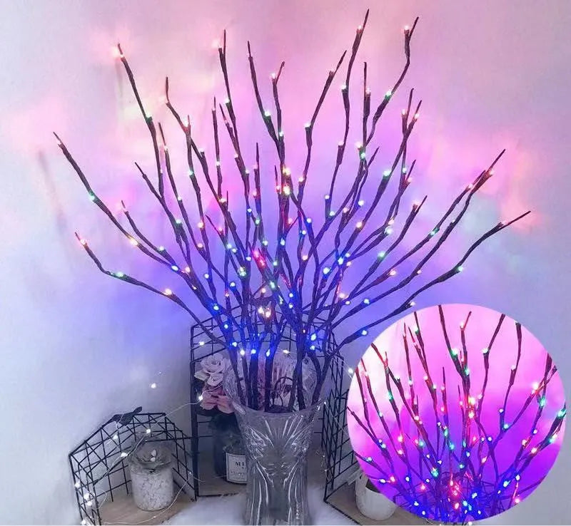 LED decorative tree light in a vase with silver branches illuminated in a choice of six colours.