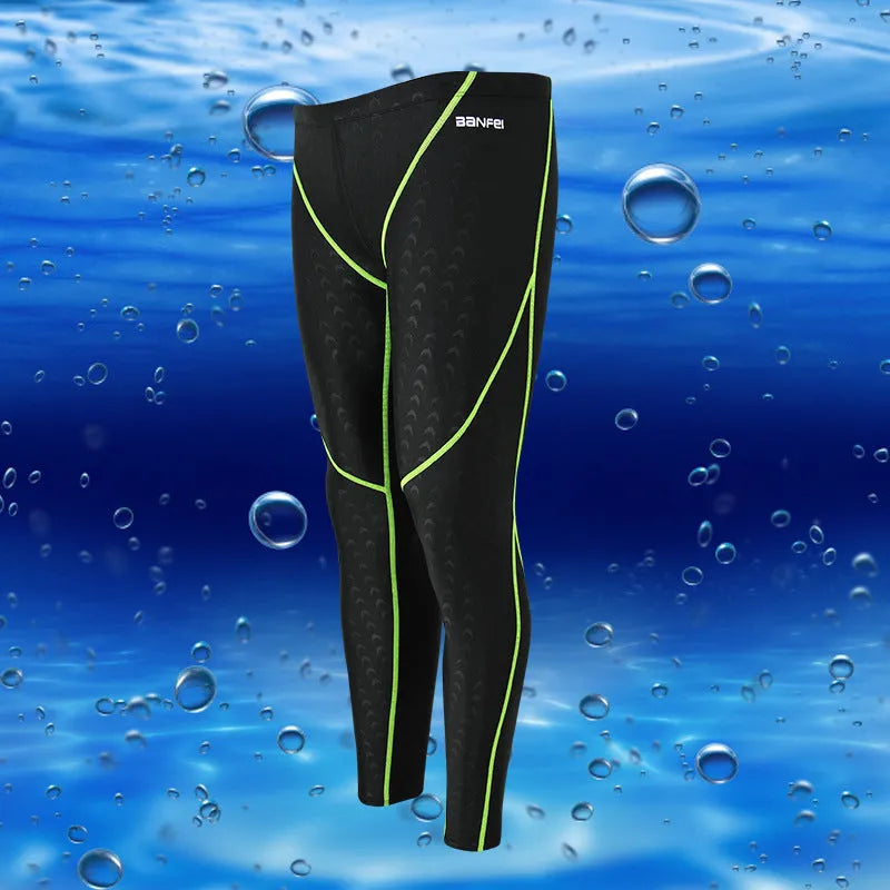 Men's black nylon cropped swimming trunks with green line detail for swimming and sports