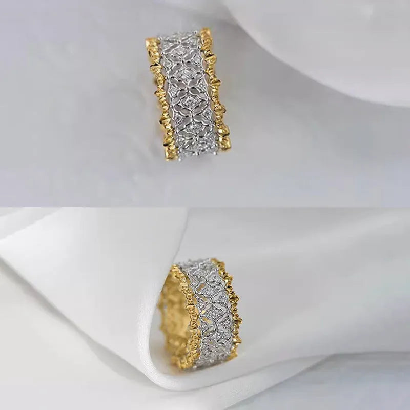 Geometric two-tone gold zircon ring on a copper band, showing round design elements.