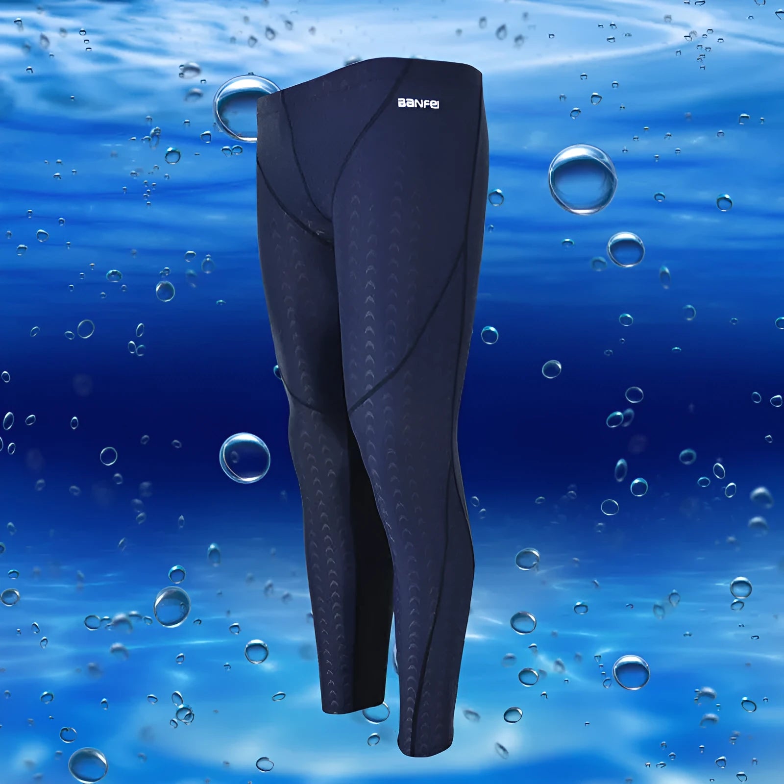 Men's black nylon cropped swimming trunks with green line detail for swimming and sports