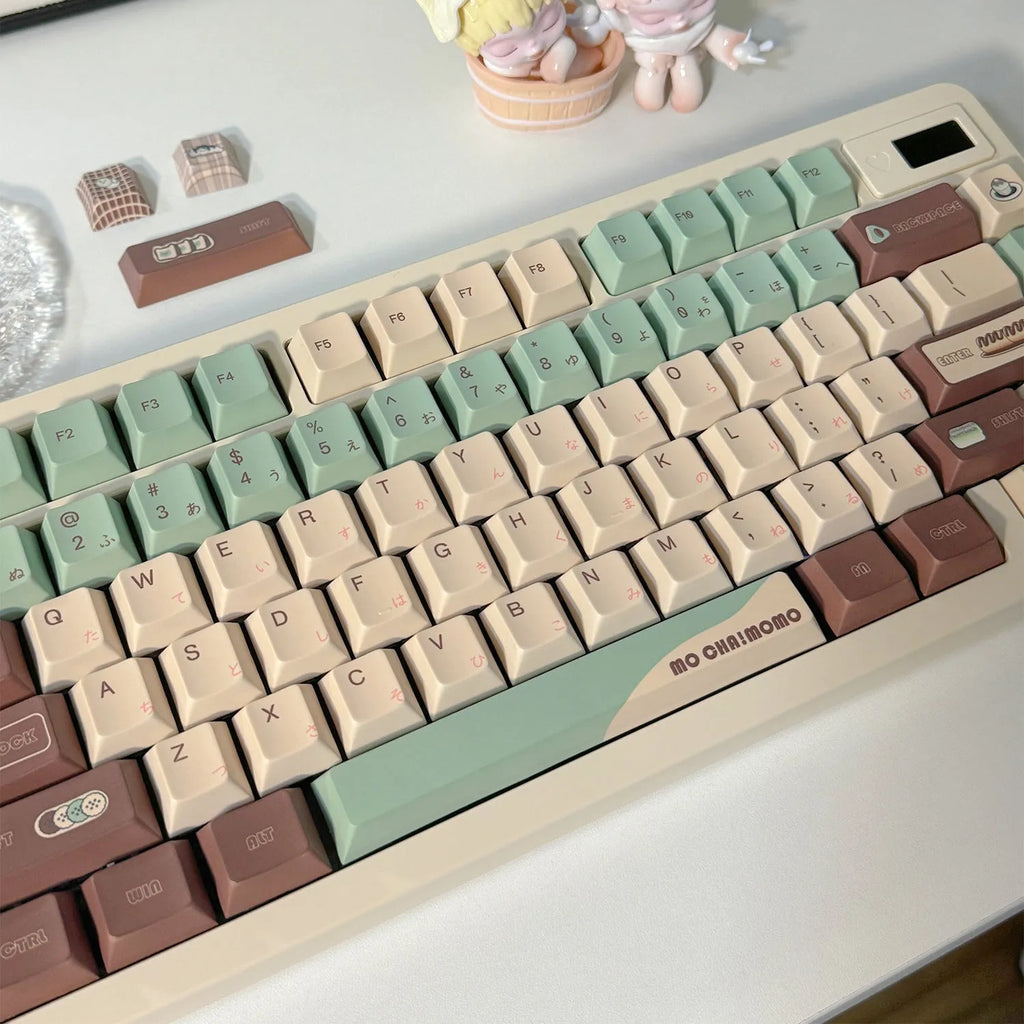Matcha green mechanical keyboard keycap set with sublimation printing, shown with a key puller tool.