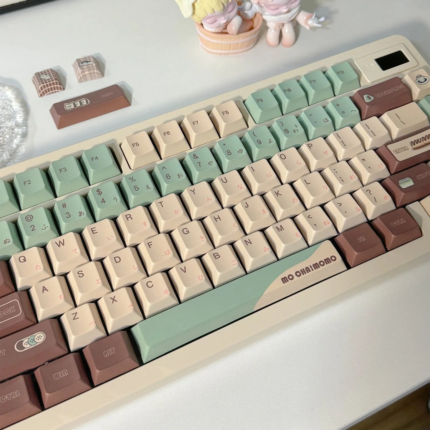 Matcha green mechanical keyboard keycap set with sublimation printing, shown with a key puller tool.