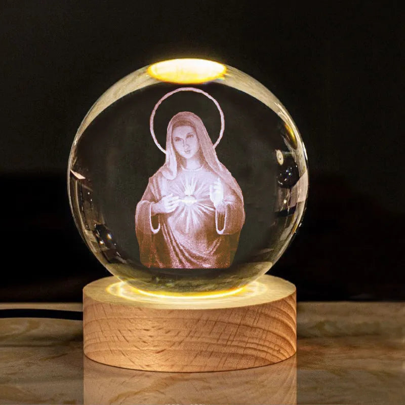 White crystal cross ornament with 6cm ball on wooden warm light base