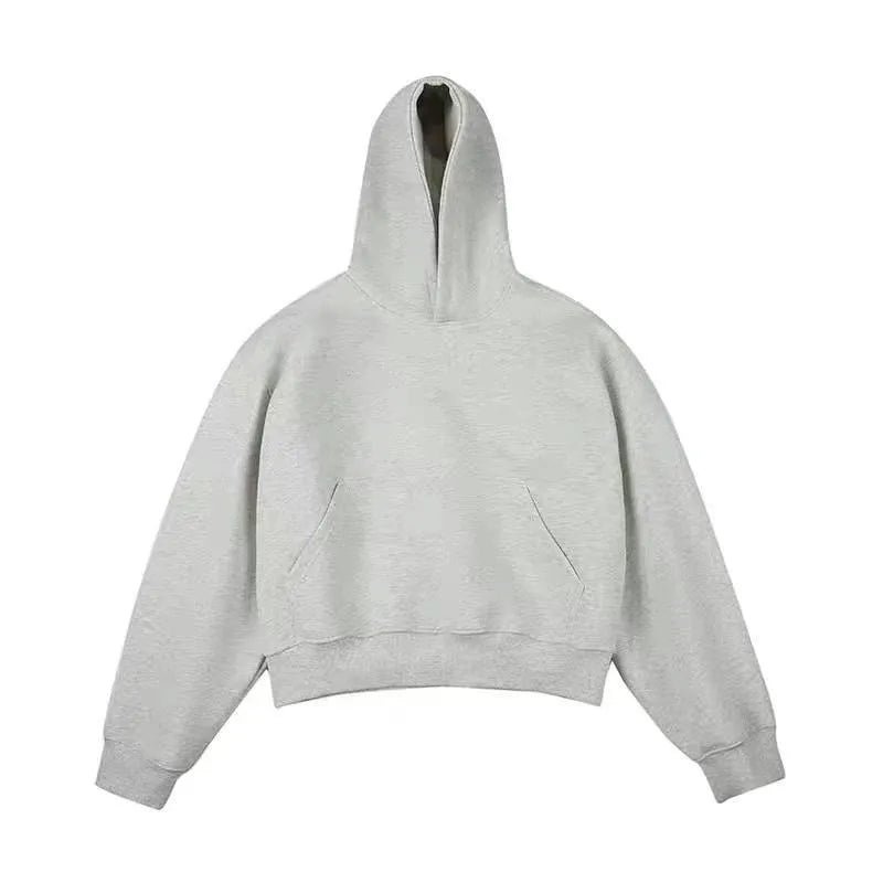 Short black cotton composite velvet hooded sweater with a removable hood on a hanger.