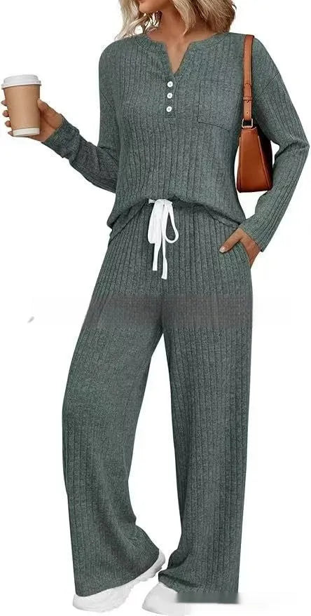 Knitted V-neck long coat with striped pattern in light grey colour showing lace-up details
