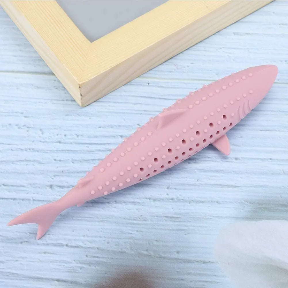 Green silicone fish-shaped chew toy for cats on a white background