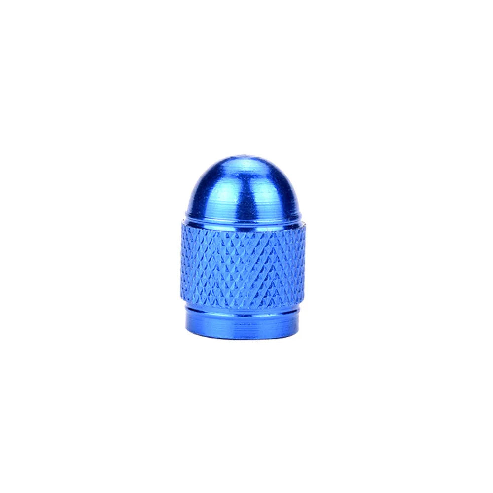 Aluminium mountain bike tyre valve dust cap in gold, red, silver, blue, and black colours.