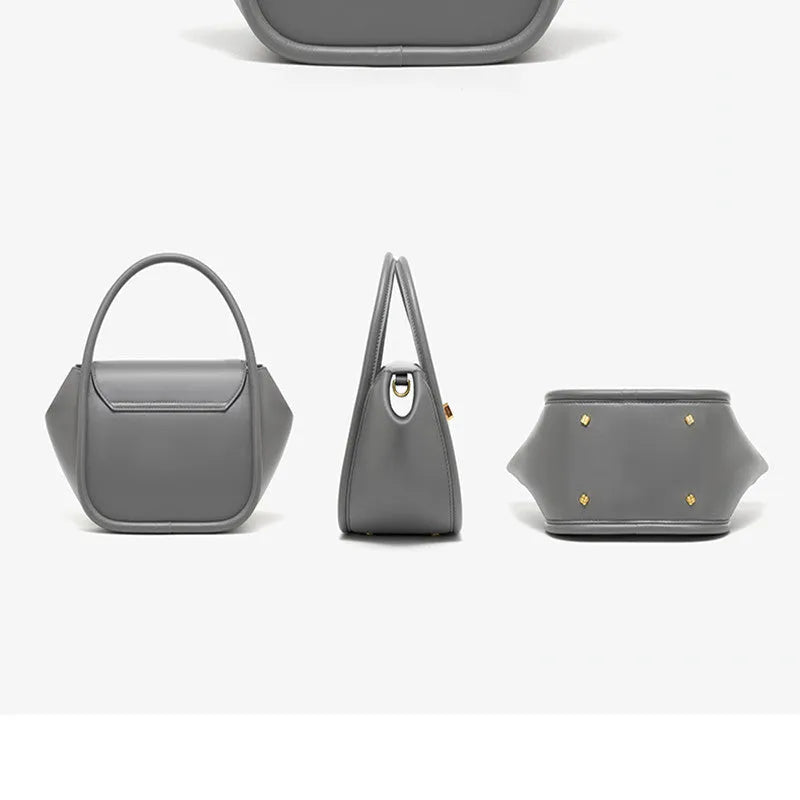 Women's leather wing tote bag with cross-body strap and latch closure in various colour options