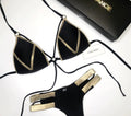 Women's bronzing bikini swimsuit with padded cups and cotton lining in multiple colour and print options.