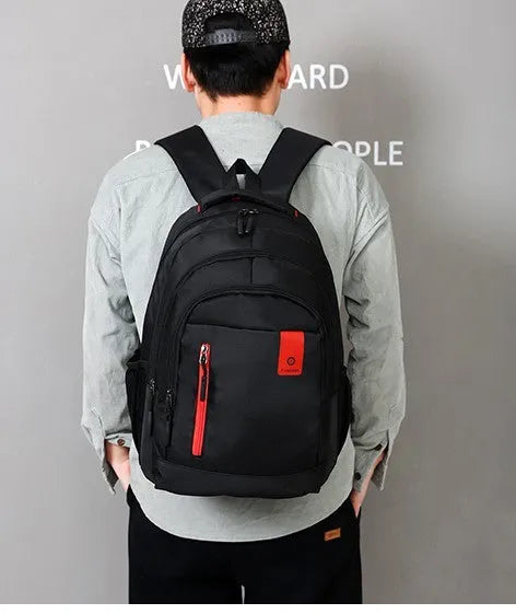 Oxford fabric backpack with breathable shoulder straps and side pockets in multiple colour options