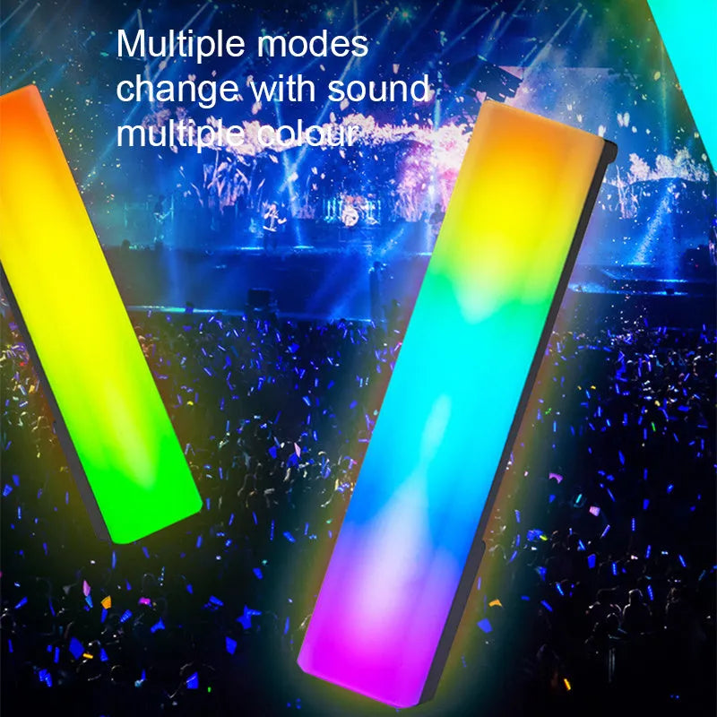 Tall 3D RGB LED ambience lamp with colourful lights on a desk, showcasing its voice-activated music rhythm mode.