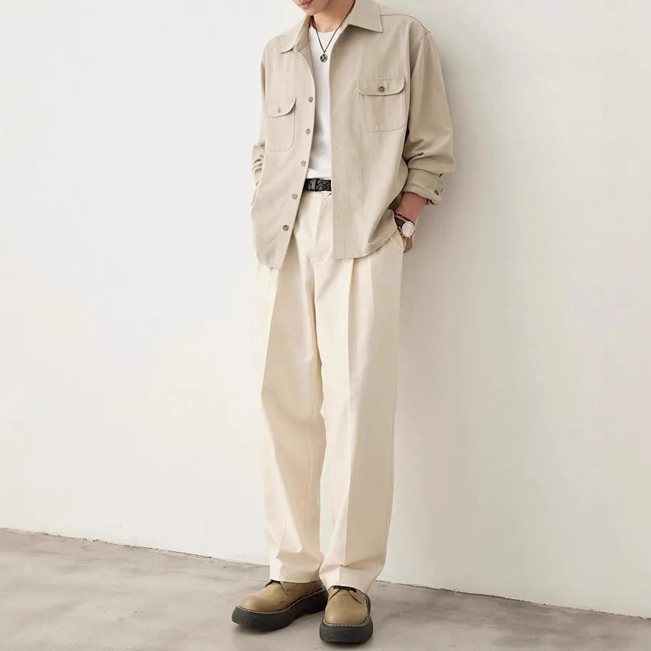 Men's light sand rice coloured long sleeve shirt with a simple lapel and collage stitching.