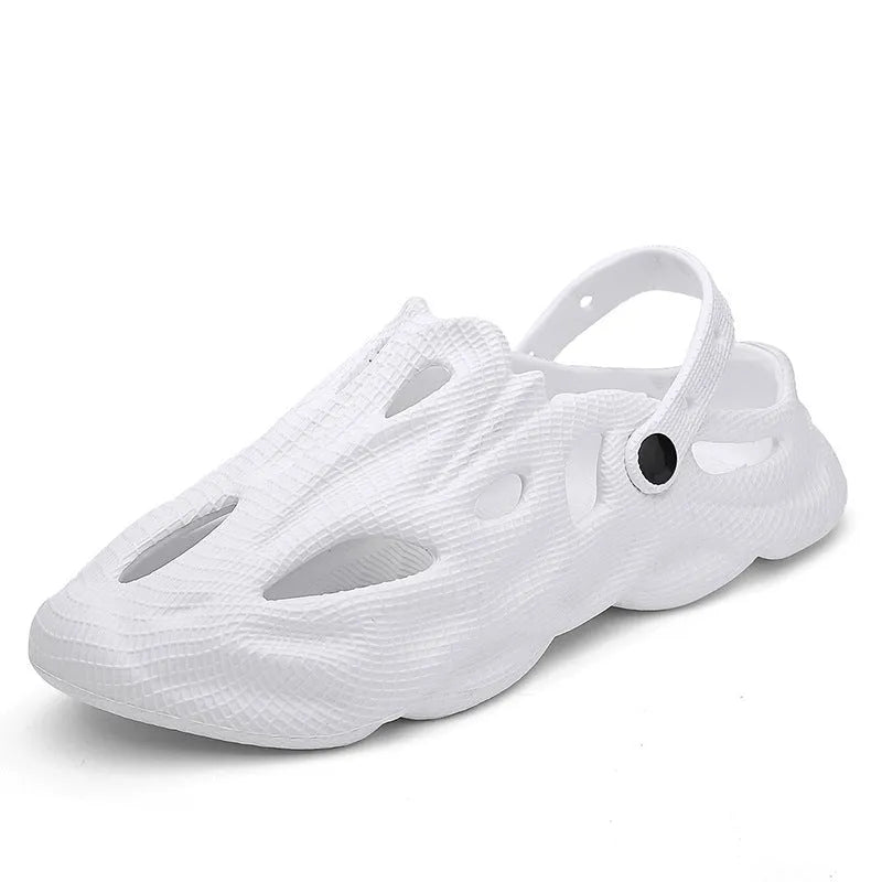 EVA soft men's summer beach shoes in grey colour on sandy surface