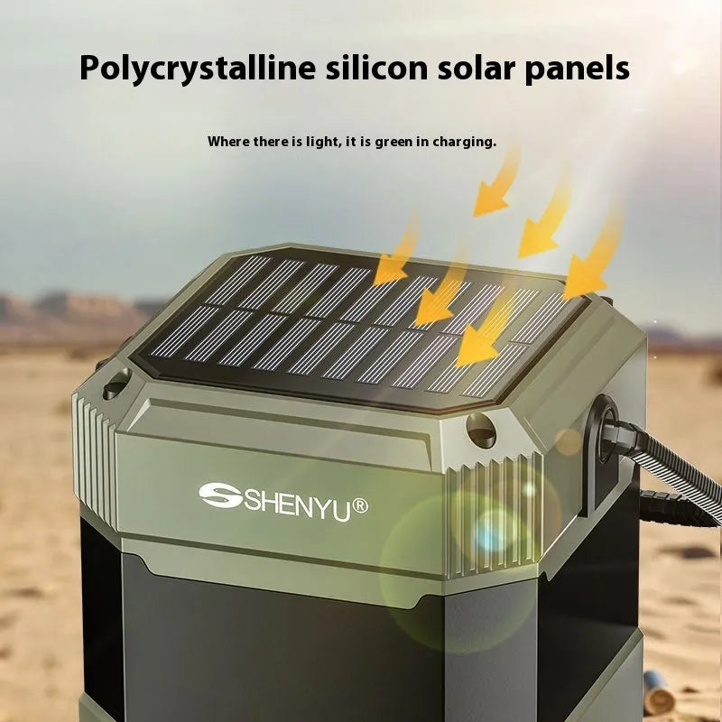 Solar radio Bluetooth speaker camping lantern with hand crank generator and power bank on outdoor background