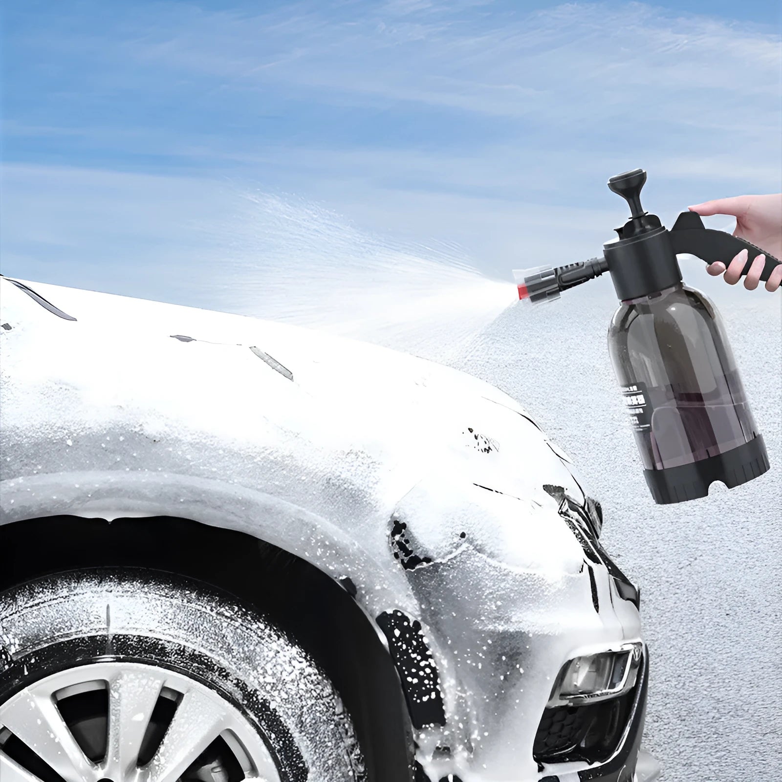 Black hand-held 2-litre multi-purpose sprayer with ergonomic handle and two nozzles