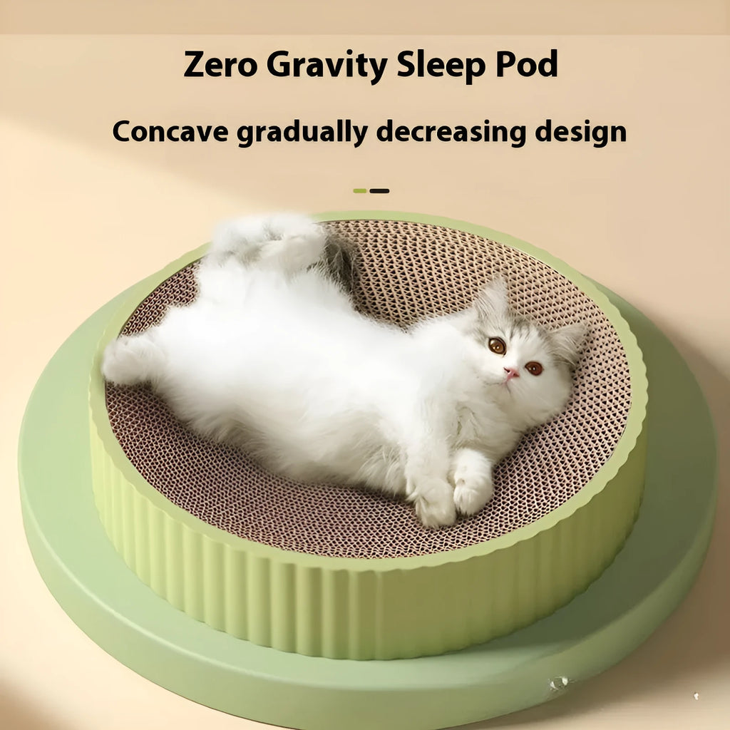 Green and white round cat scratching board with corrugated cardboard surface measuring 55cm across