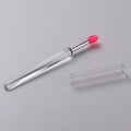 Set of reusable silicone lip brushes with caps in blue, pink, purple, red, rose red, skin colour, white, and yellow.