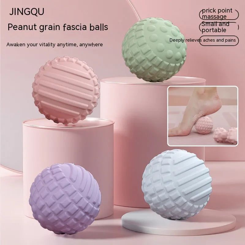 A 6cm diameter TPR foot massage ball shown in one of four colour options: pink, blue, green, or purple.