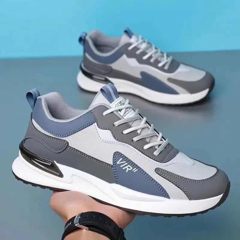 Men's colour block mesh sneakers in black, grey, or white on a plain background