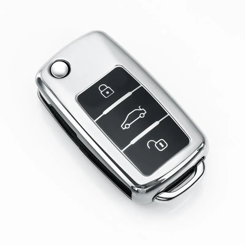 Blue TPU key case for VW Model A folding car keys on a keyring.