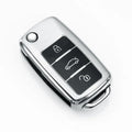 Blue TPU key case for VW Model A folding car keys on a keyring.