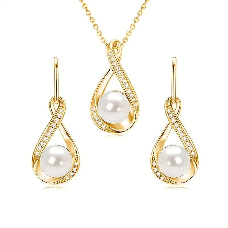 Alloy simulated pearl clavicle chain with diamond inlaid heart pendant, gold finish, on a white background