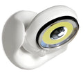 White Atomic Angel induction light lamp on a surface showing its compact size.