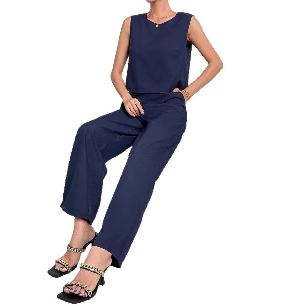 Red and navy blue women's sleeveless top and wide leg pants two-piece set on a hanger.