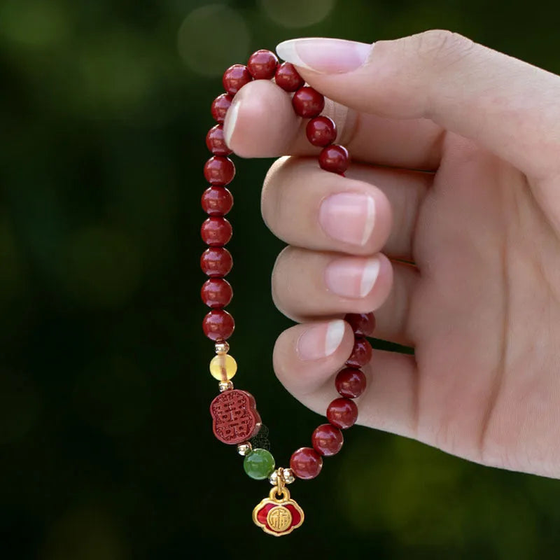 Emperor sandstone cinnabar bracelet with fu character, showing 6mm and 8mm bead size options.