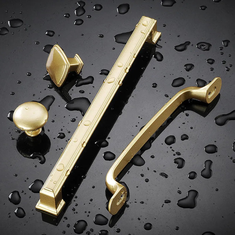 Gold single-hole cabinet handle with T-shape design for drawers and cabinets