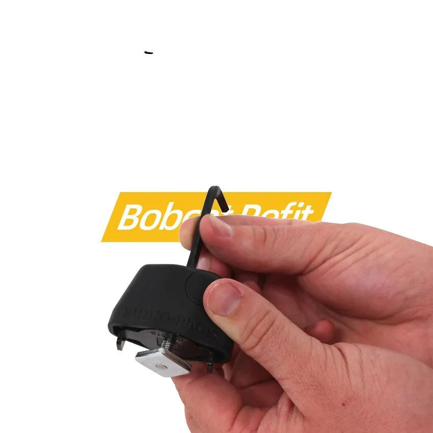 Plastic-sheathed steel cable lock for roof platforms shown securing a kayak.