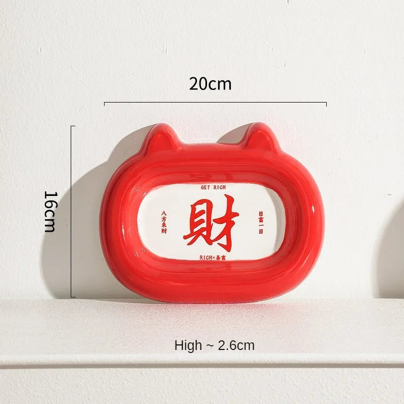 Ceramic pet bowl with an animal design, shown on a table.