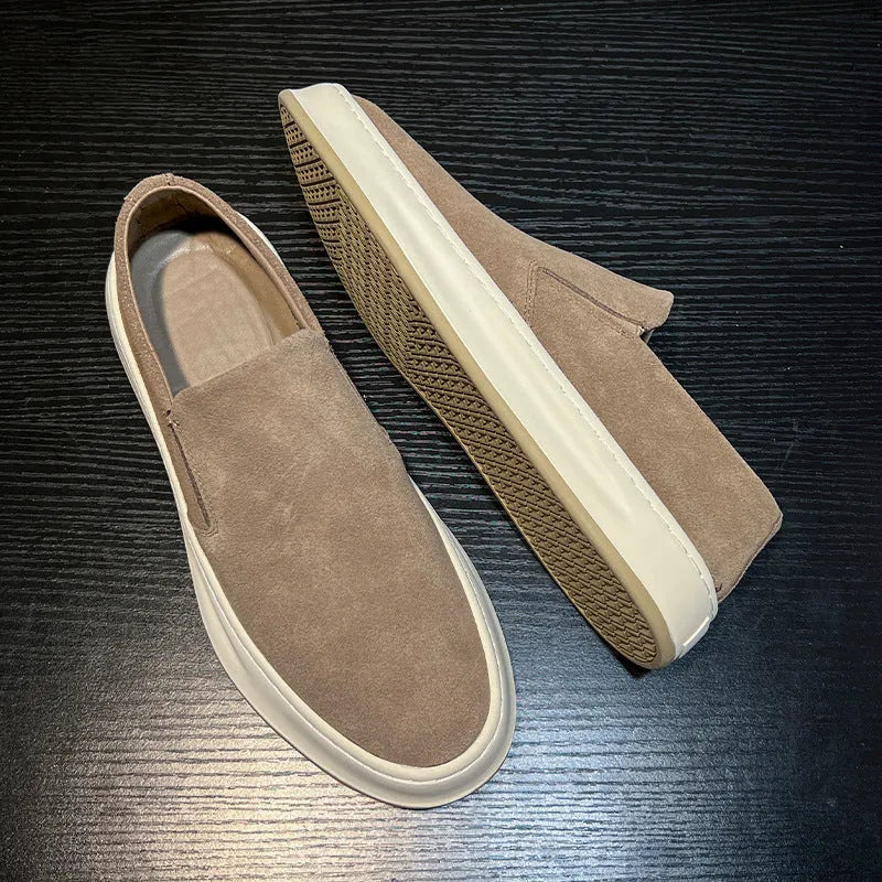 Men's grey casual shoes with round toe and sewing line detail on PU upper