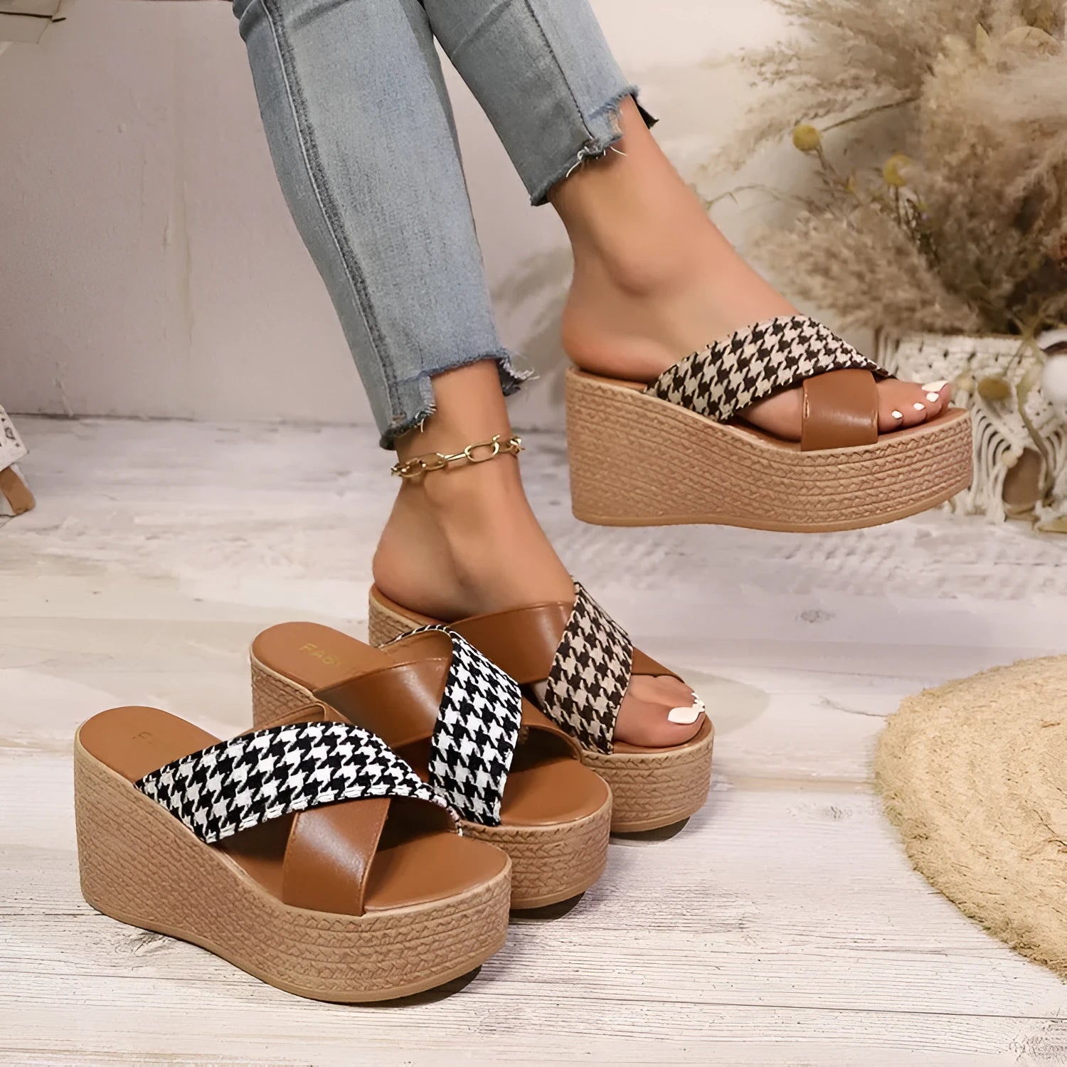 Brown and black cross leopard plaid pattern wedge sandals with a rubber sole.