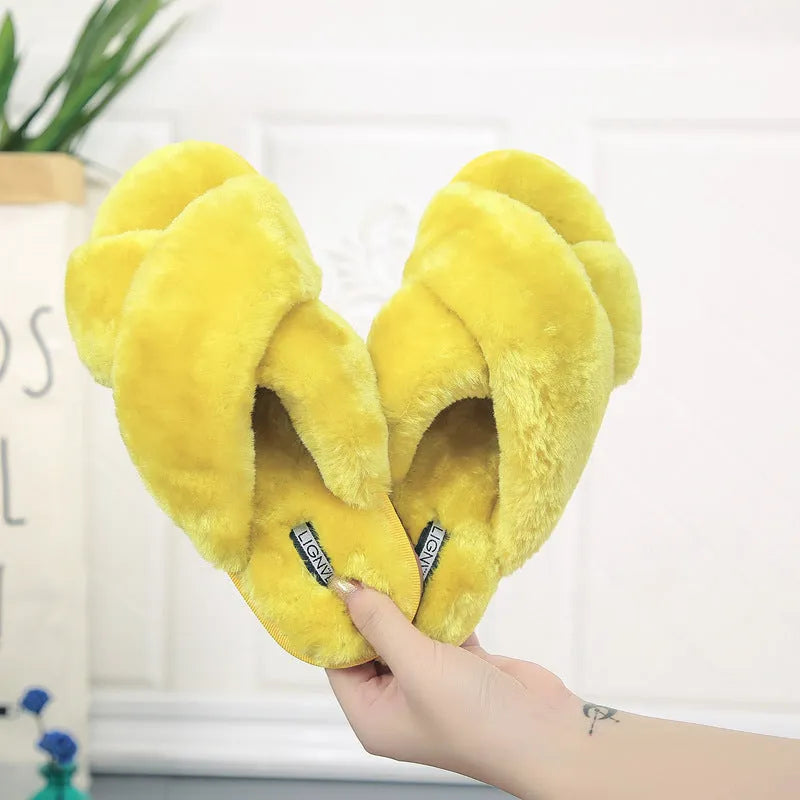 Cross open-toe fur slippers in multiple colours showing fur lining and patterned non-slip sole.