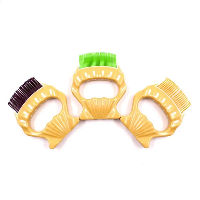 Shell-shaped pet grooming brush with bent wire bristles and anti-slip handle in green, orange, or purple colours