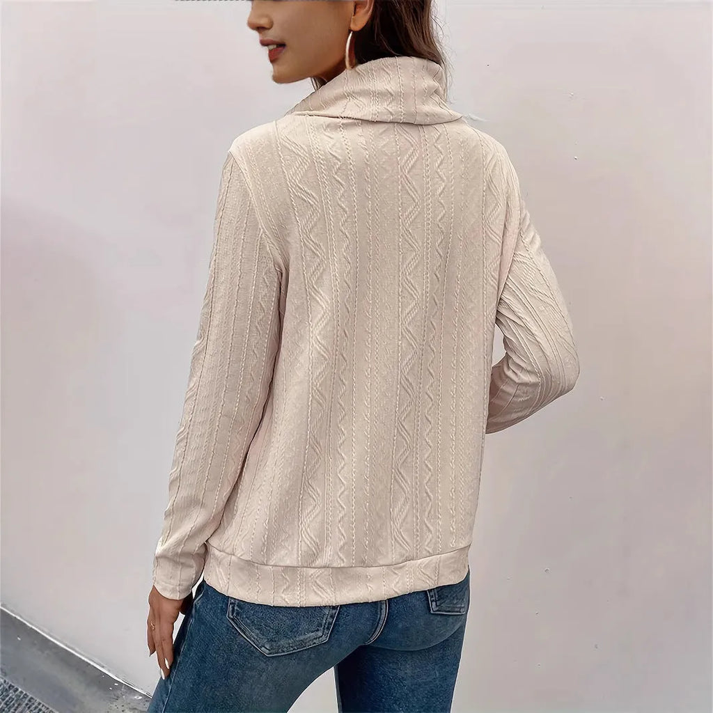 Apricot coloured women's hooded pullover sweater with long sleeves and a front drawstring.