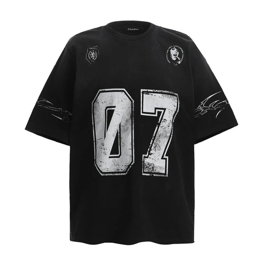 Man wearing a black printed short-sleeved cotton t-shirt showing the front design.