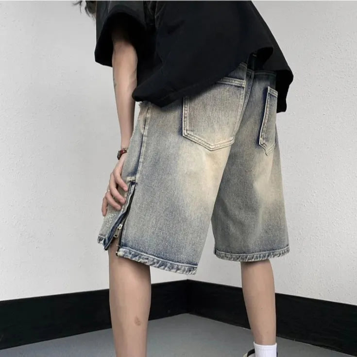 Blue retro-style denim shorts with a loose wide-leg fit on a mannequin.