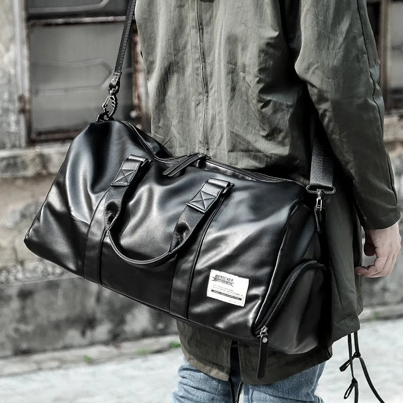 Trend black portable travel bag with detachable shoulder strap and zipper closure, 48cm wide