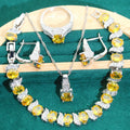 Four-piece bridal zircon jewellery set with necklace, earrings, bracelet and ring in water wave chain design