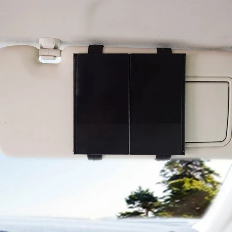 Silver car folding makeup mirror shown closed at 15.5x14cm and opened at 30.5x14cm.