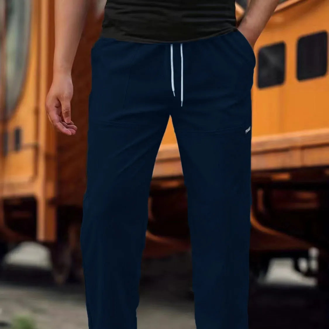 Men's casual polyester trousers for spring and autumn in various colours including light gray and black