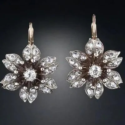 Electroplated silver retro fashion earrings for women with alloy construction and creative design