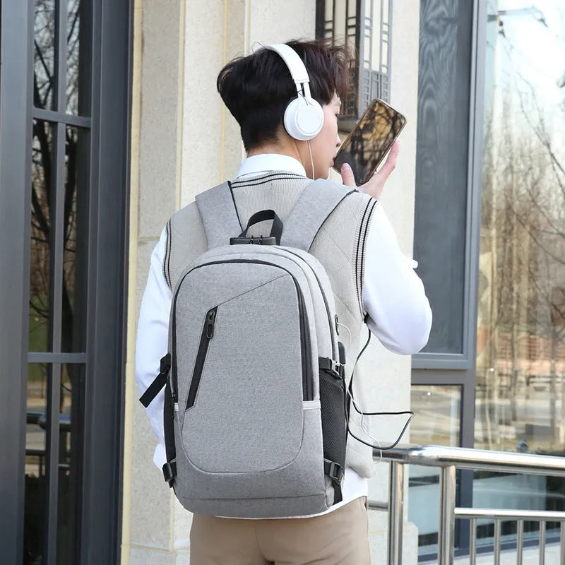 Blue Oxford cloth computer backpack for travel with laptop compartment.